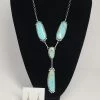 The Sparkling Spur 4 Stone Necklace & Earring Set Jewelry