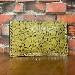 Brand new π The Sparkling Spur Python Envelope Clutch π Handbags/Belts/Accessories π 5 The Sparkling Spur Python Envelope Clutch Handbags/Belts/Accessories